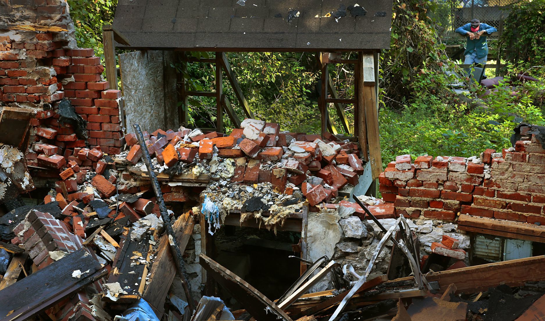 In neighborhoods forgotten, residents cling to hope as cleanup efforts sprout